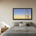 Room visualisation of The Wheel at Twilight in a black frame, shown at 80 x 45 cm