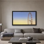 Room visualisation of The Wheel at Twilight in a black frame, shown at 80 x 45 cm
