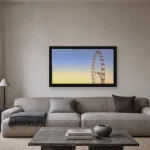 Room visualisation of The Wheel at Twilight in a black frame, shown at 64 x 36 cm