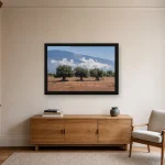 Room visualisation of Three Olive Trees in a black frame, shown at 75 x 50 cm