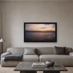 Room visualisation of Crossing at Dawn in a black frame, shown at 64 x 36 cm
