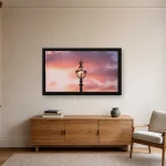 Room visualisation of Crown Lamp at Sunset in a black frame, shown at 80 x 45 cm
