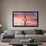 Room visualisation of Crown Lamp at Sunset in a black frame, shown at 80 x 45 cm