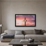 Room visualisation of Crown Lamp at Sunset in a black frame, shown at 64 x 36 cm