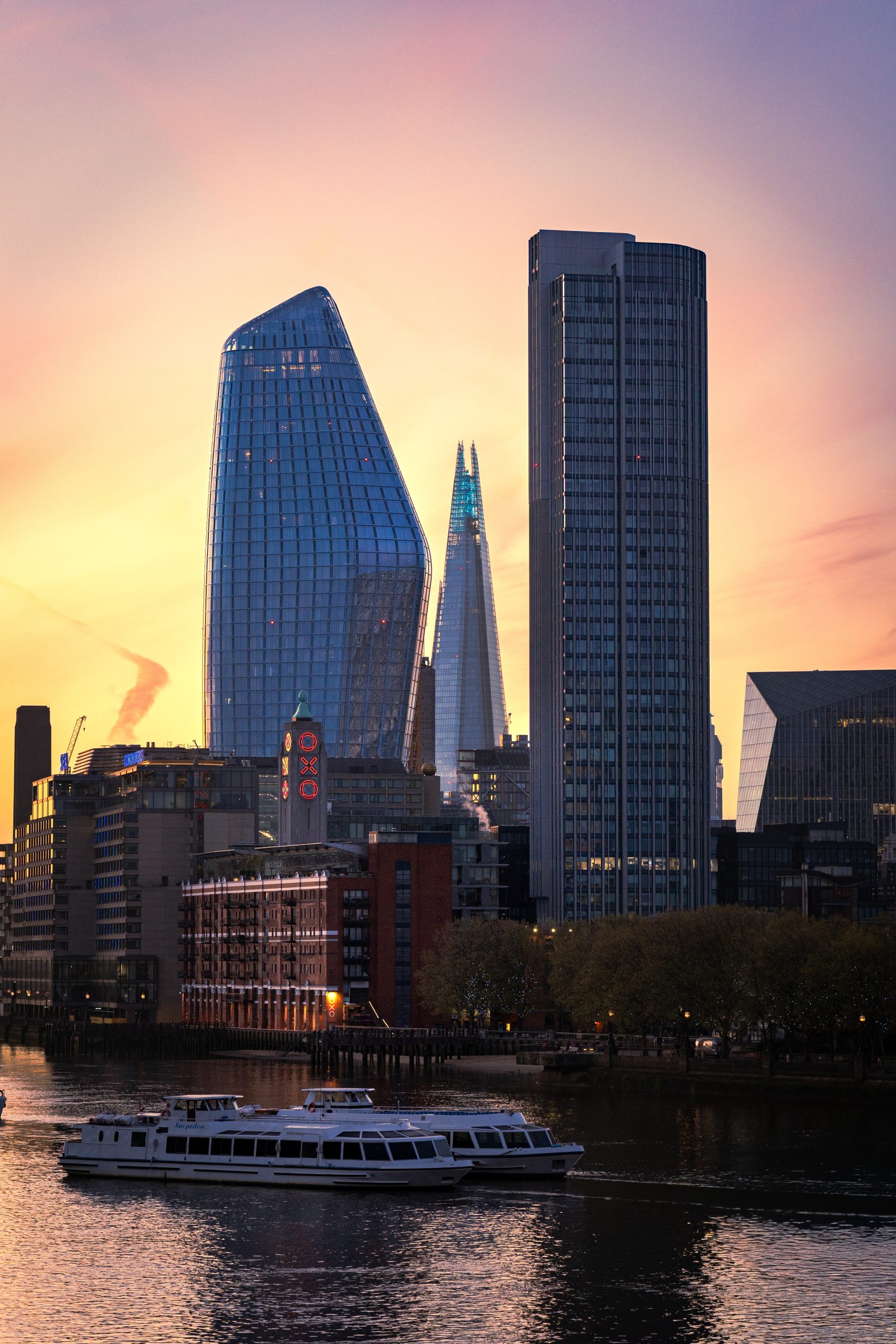City Glow at Dusk London skyline photography print with warm windows and a dark evening sky